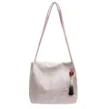 Pink Chinese style brocade tote bag with traditional pattern and tassel detail - Light Pink