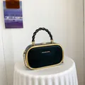Pochette boîte ovale noire élégante avec cadre doré et poignée tressée pour femme - Noir Élégant