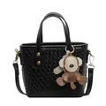 Black woven textured tote bag with top handles and a cute monkey bag charm - Single Bag / Black
