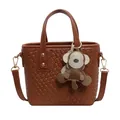 Brown woven tote bucket bag with dual handles, crossbody strap and monkey charm decoration - Single Bag / Brown