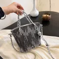 Grey sequined bucket bag with silver chain strap and chic land lettering detail - Sequin Black