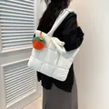 Quilted white puffer tote bag with bow detail and orange plush charm accessory - Single Bag / White