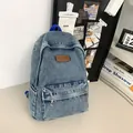 Sac à dos en denim bleu délavé pour étudiants avec poche zippée et écusson en cuir - Rose bonbon