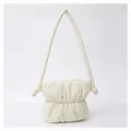 Quilted cream puffer shoulder bag with stylish pleats and soft cloud-like texture - White
