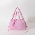 Pink quilted puffer shoulder bag with lightweight down-filled texture and drawstring - Pink