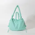 Mint green quilted puffer tote bag with shoulder strap and knot detail for women - Lake Blue