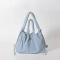 Quilted light blue puffer tote bag with large capacity and drawstring detail - Blue