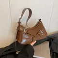 Brown faux leather hobo shoulder bag with silver buckles and retro biker style details - Brown