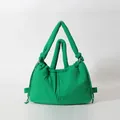 Bright green quilted puffer tote bag with soft padded texture and drawstring detail - Green