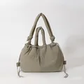 Padded quilted tote bag in olive green with drawstring closure and knotted handles - Khaki