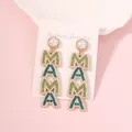 Detail of MAMA letter earrings with blue and green rhinestones and faux pearls - Green M Cyan A