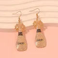 Champagne bottle earrings with pearls and black rhinestones featuring Cheers text - Pearl Style