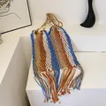 Handmade hollow woven beach bag with colorful stripes, fringe details and wooden beads - Colorful
