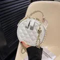 White quilted circular shoulder bag with silk scarf handle and golden chain strap - White