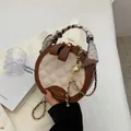 Brown and cream round crossbody bag with quilted pattern and silk scarf handle - Brown and Off-white