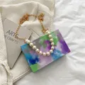 Artistic watercolor tie-dye box handbag with large pearl handle and gold chain strap - Purple