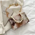 Brown marble pattern box bag with luxury pearl handle and golden chain strap - Brown