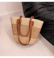 Handwoven straw tote bag with brown leather straps and horizontal stripes for summer beach trips - White Striped