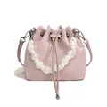 Pink drawstring bucket bag with decorative white beaded handle and detachable strap - Purple