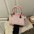 Pink tote bag with silver star prints and woven handles for casual fashion style - Pink