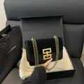 Elegant black flap crossbody bag with gold geometric lock and chain in luxury gift box - Black