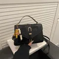 Women's trendy black crocodile embossed shoulder bag with unique beaded tassel charm - With Pendant / Black