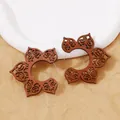 Creative C-shape walnut wood hollow mandala flower pattern earrings with silver posts - Brown