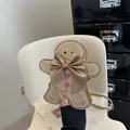 Borsa a tracolla omino di pan di zenzero in oro scintillante con dettagli a cuore rosa - Oro