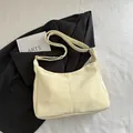Creamy cream leather dumpling tote bag with lychee texture and adjustable strap - No Pendant / Yellow