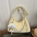 Creamy yellow half-moon crossbody bag with pearl chain and cloud plush pendant accessory - With Pendant / Yellow