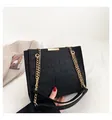 Chic black croc-embossed shoulder bag with golden chain strap and top metal accents - Black