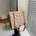 Beige crossbody bag with geometric quilted texture and gold chain straps for women - Off White
