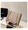 Beige faux crocodile skin shoulder bag with elegant gold chain strap and metal trim - Khaki