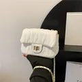 Elegant white quilted crossbody bag for women with gold chain strap and twist lock - White