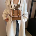 Brown faux suede backpack with plush trim and buckle straps for women's winter fashion - Brown