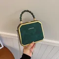 Dark green hexagonal shoulder bag with gold chain strap and metallic handle - Green