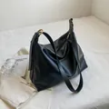 Large black pebbled leather tote bag with gold ring hardware and wide shoulder strap - Best Seller / 36x14x27cm / Black