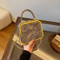 Retro square box bag in distressed brown with gold chain and woven handle detail - Khaki