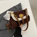 Retro plaid shoulder bag in red, green and brown with white fleece trim and leather strap - Brown