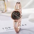 Women's rose gold rhinestone bracelet watch with black dial and Roman numeral markers - Rose Gold Case Black Dial