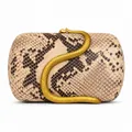 Macro shot of faux snakeskin texture and ornate golden serpent clasp on the clutch - Khaki