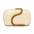 Detail of a creamy leather clutch featuring a golden snake ornament and metallic texture - Apricot