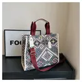 Large geometric woven tote bag with burgundy straps and white leather trim accents - White Small