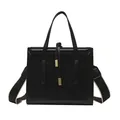 Black leather square handbag with geometric stitching and wide woven shoulder strap - Black