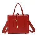 Fashionable red square crossbody bag with dual top handles and stylish webbed strap - Red