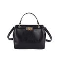 Chic black faux leather handbag with golden rectangular twist lock and adjustable strap - Black