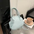 Light blue vintage shell bag with kiss-lock closure and adjustable strap for women - Blue