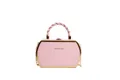 Chic pink hexagonal crossbody bag with unique twisted handle and gold chain strap - Pink