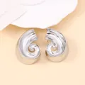 Vintage style irregular silver spiral metal stud earrings with a polished mirror finish - Shiny Silver Spiral Style (Style A)
