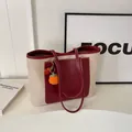 Minimalist cream canvas and burgundy leather tote bag with orange fruit charm - No Pendant / Red